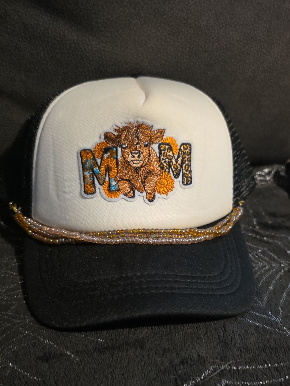 White and Black Trucker Hat with Embroidered Brown Cow
